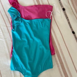 Pair of thong bodysuits